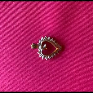 Diamond and gold heart pendant
